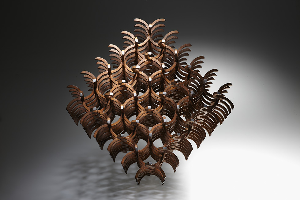Acero inoxidado, 45 x 45 x 45 cm.